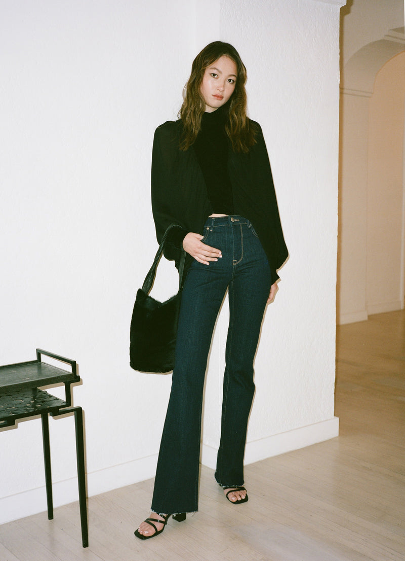 REVERSIBLE SHEARLING MOCHILA BUCKET BAG