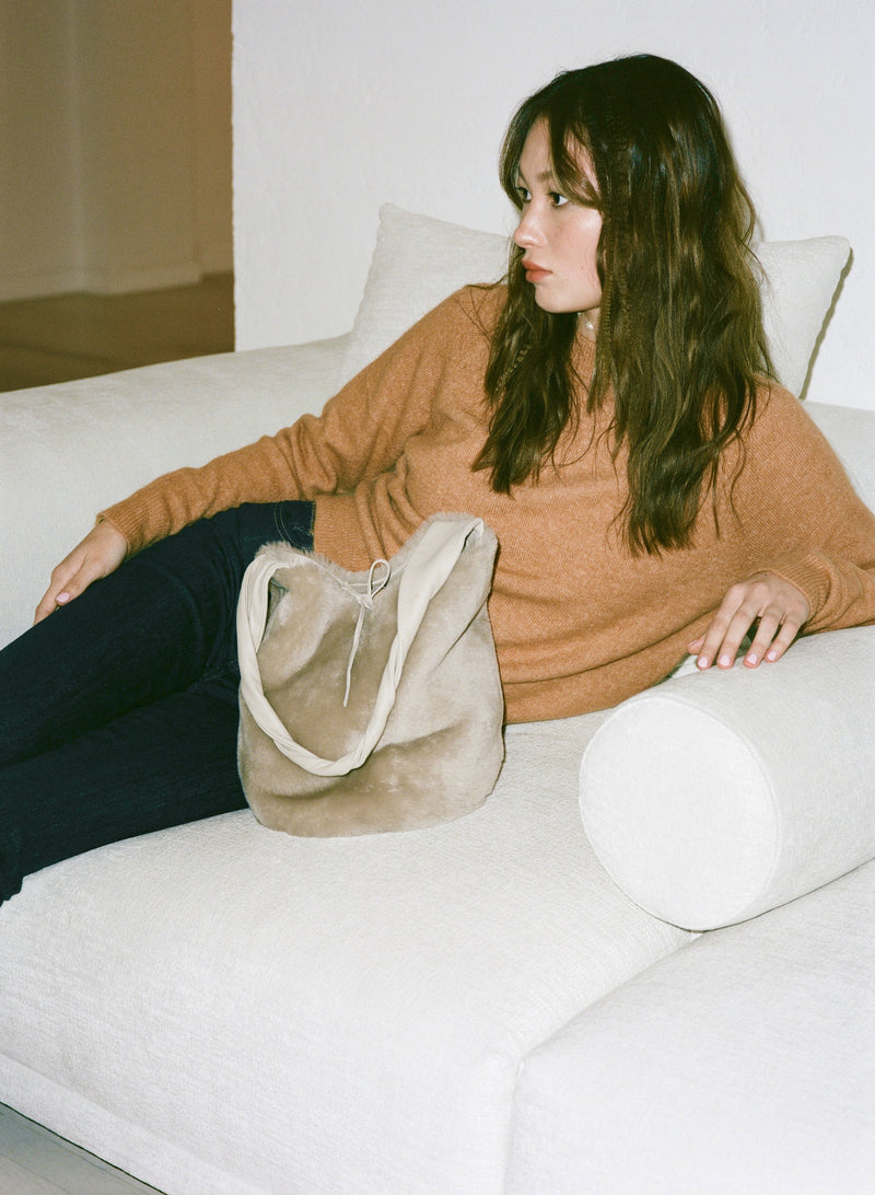 REVERSIBLE SHEARLING MOCHILA BUCKET BAG